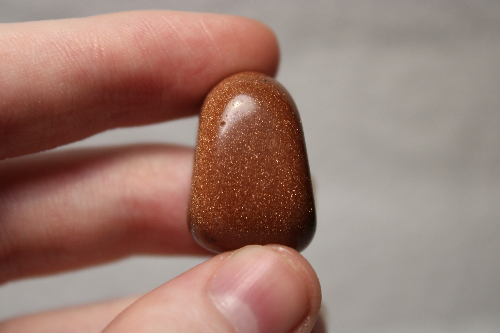 Polished brown glittery stone.